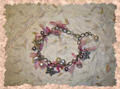 bracciale con perle e cristalli swarovski e accessori in metallo