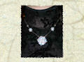 collana con ciondolo in cristalli bicono