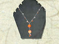 collana con perle in ceramica e biconi swarovski