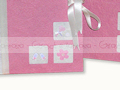 Beb� rosa con finestrelle rivestito in carta naturale - particolare